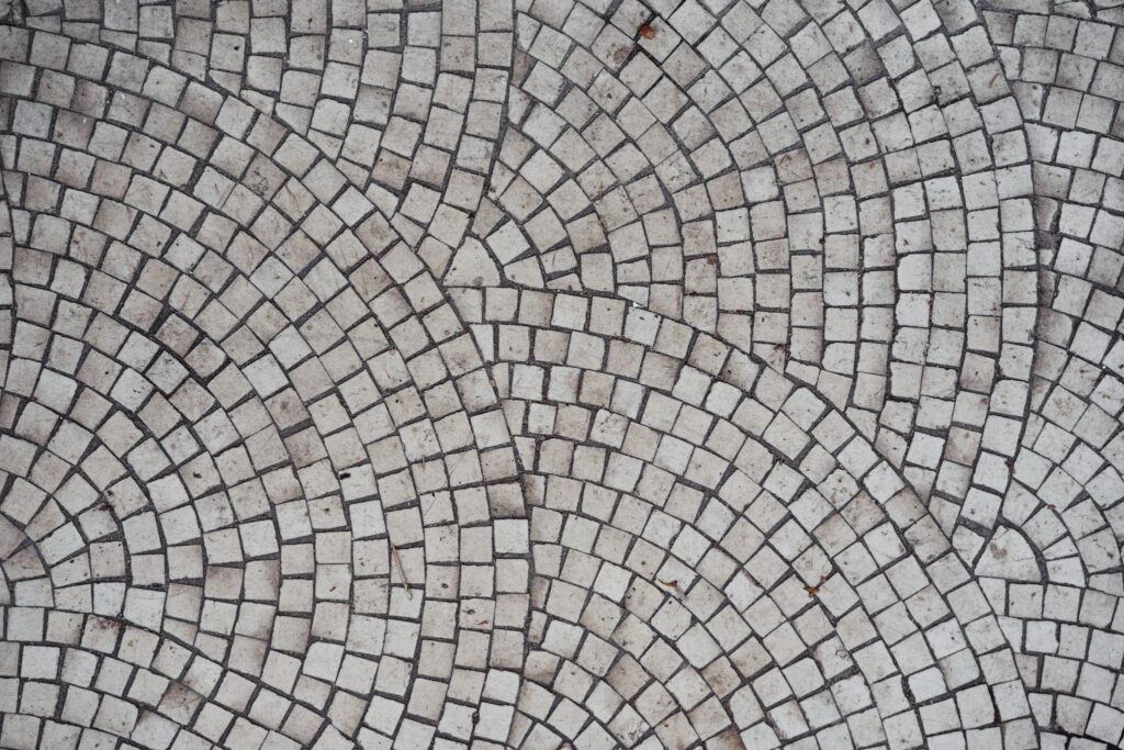 Mosaic old gray ceramic tile with round pattern