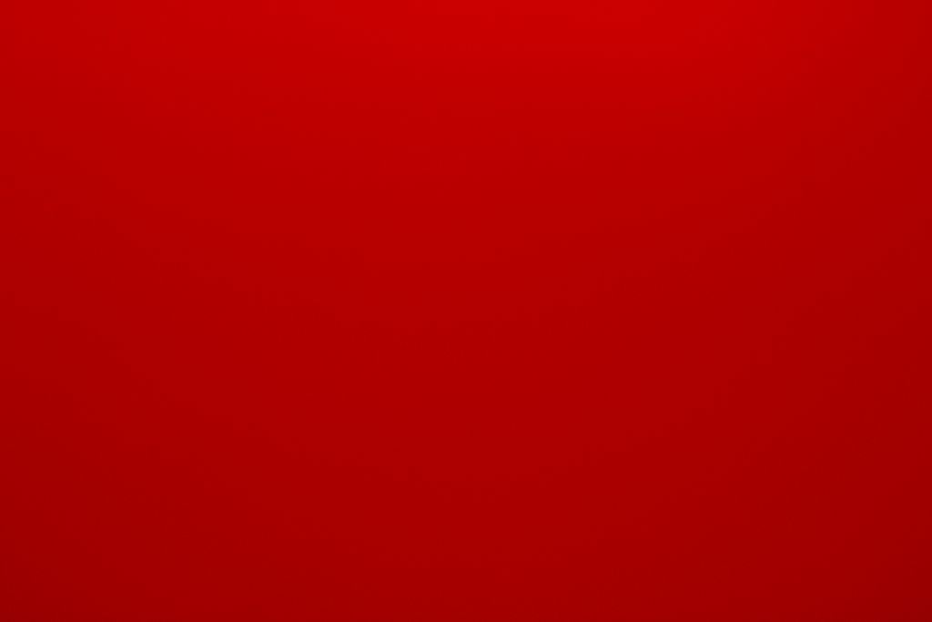 Bright and bold red abstract background, ideal for vibrant designs.